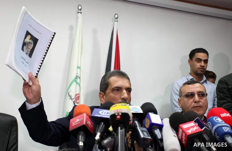 Tawfiq Tirawi, the head of the Palestinian inquiry team into the death of the late Palestinian leader Yasser Arafat, speaks to reporters during a press conference in the West Bank city of Ramallah, on November 24, 2012....
