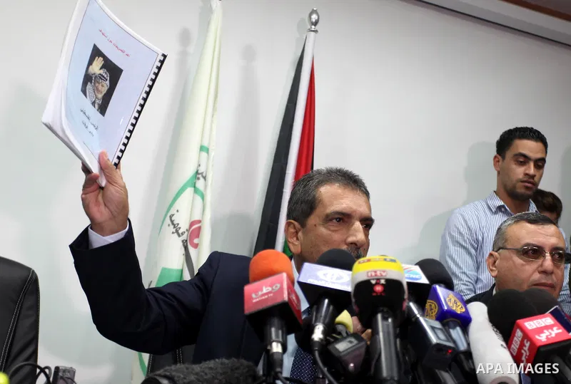 Tawfiq Tirawi, the head of the Palestinian inquiry team into the death of the late Palestinian leader Yasser Arafat, speaks to reporters during a press conference in the West Bank city of Ramallah, on November 24, 2012....