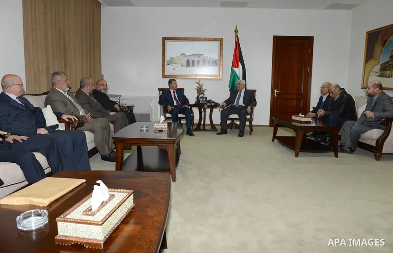 President Mahmoud Abbas (Abu Mazen), meets with a delegation of the Hamas leadership in the West Bank city of Ramalllah. on Nov. 24, 2012. Photo by Thaer Ganaim