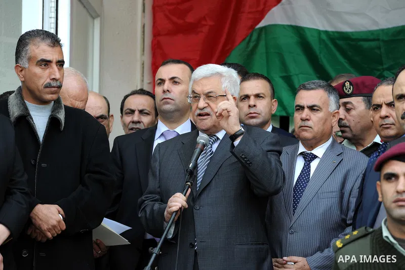 Palestinian President Mahmoud Abbas gestures as he speaks during a rally supporting the Palestinian UN bid for observer state status, in the West Bank city of Ramallah, Sunday, Nov. 25, 2012. The Palestinians will reques...