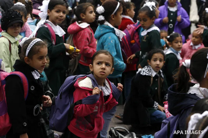 Palestinian students play in a school in Rafah southern Gaza City, 25 November 2012. Normal life in Gaza resumed remarkably fast after a ceasefire agreement was announced following eight days of cross border violence bet...