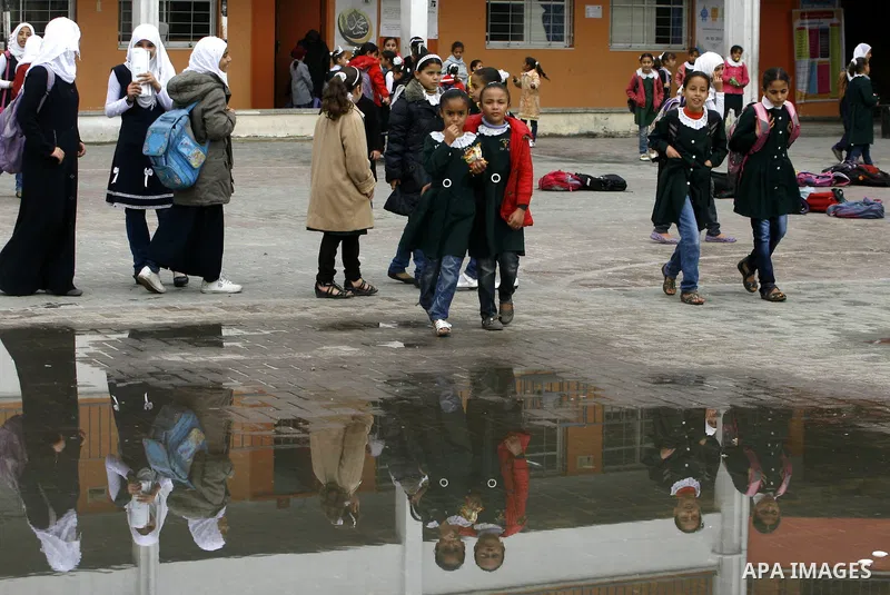 Palestinian students play in a school in Rafah southern Gaza City, 25 November 2012. Normal life in Gaza resumed remarkably fast after a ceasefire agreement was announced following eight days of cross border violence bet...