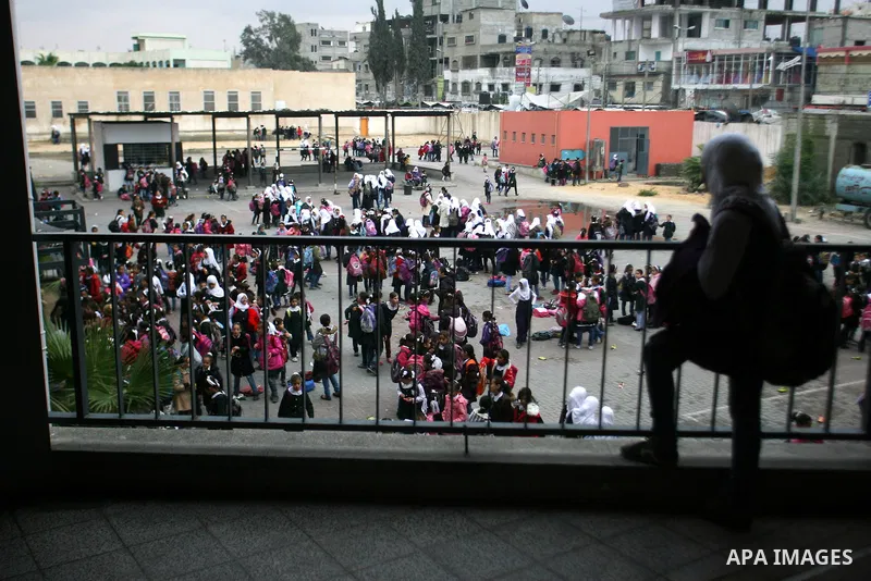 Palestinian students play in a school in Rafah southern Gaza City, 25 November 2012. Normal life in Gaza resumed remarkably fast after a ceasefire agreement was announced following eight days of cross border violence bet...