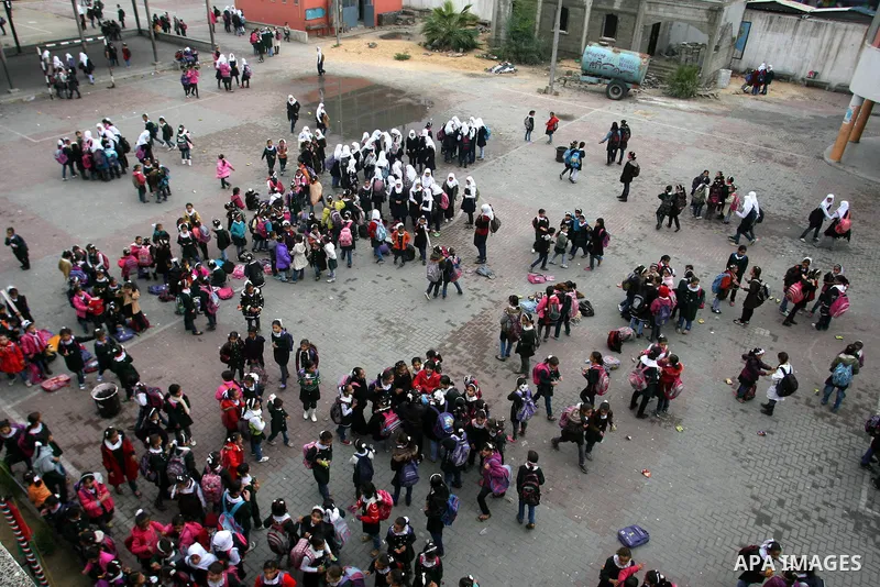 Palestinian students play in a school in Rafah southern Gaza City, 25 November 2012. Normal life in Gaza resumed remarkably fast after a ceasefire agreement was announced following eight days of cross border violence bet...