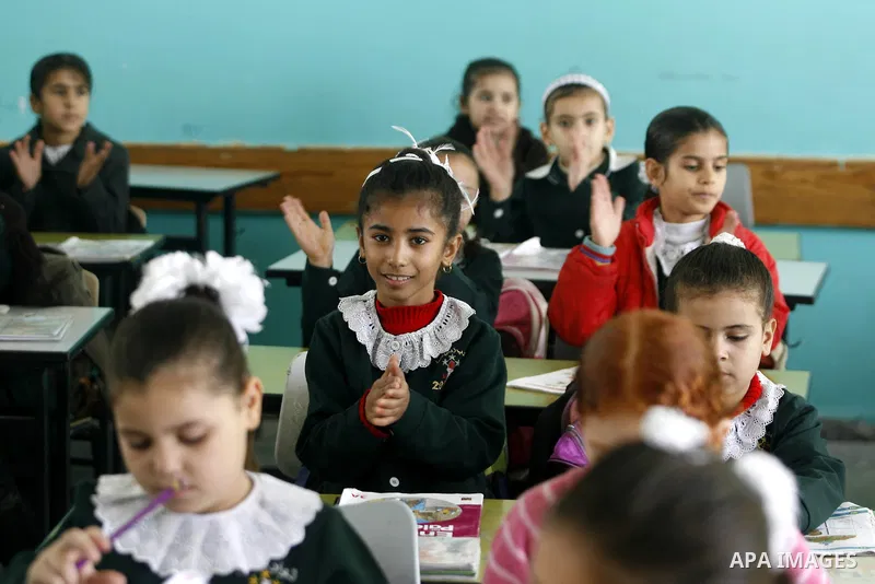 Palestinian students study at their classroom in a school in Rafah southern Gaza City, 25 November 2012. Normal life in Gaza resumed remarkably fast after a ceasefire agreement was announced following eight days of cross...