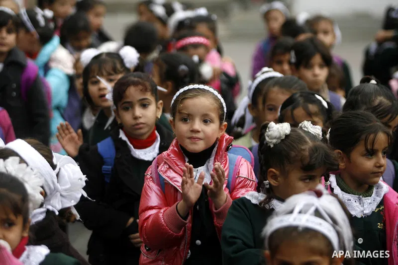 Palestinian students study at their classroom in a school in Rafah southern Gaza City, 25 November 2012. Normal life in Gaza resumed remarkably fast after a ceasefire agreement was announced following eight days of cross...