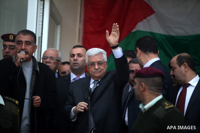 Palestinian President Mahmoud Abbas gestures as he speaks during a rally supporting the Palestinian UN bid for observer state status, in the West Bank city of Ramallah, Sunday, Nov. 25, 2012. The Palestinians will reques...