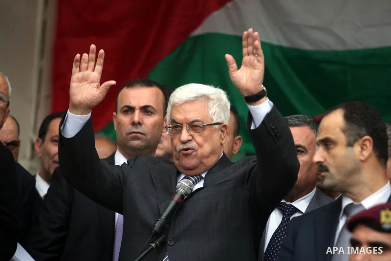 Palestinian President Mahmoud Abbas gestures as he speaks during a rally supporting the Palestinian UN bid for observer state status, in the West Bank city of Ramallah, Sunday, Nov. 25, 2012. The Palestinians will reques...