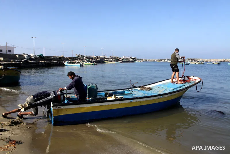 Palestinian fishermen prepare their boats in the port of Gaza on the Mediterranean coast, on Nov. 26, 2012, as a fragile truce between Israel and militant groups in Gaza enters its third day. Israel slammed Palestinian p...