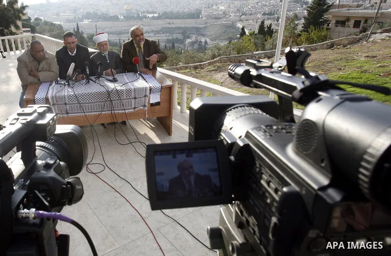 Sheikh Mohammed Hussein (second right) the Grand Mufti of Jerusalem speaks during a press conference to support the Palestinian UN bid for observer state status, in Jerusalem, Nov. 26, 2012. The Palestinians will request...