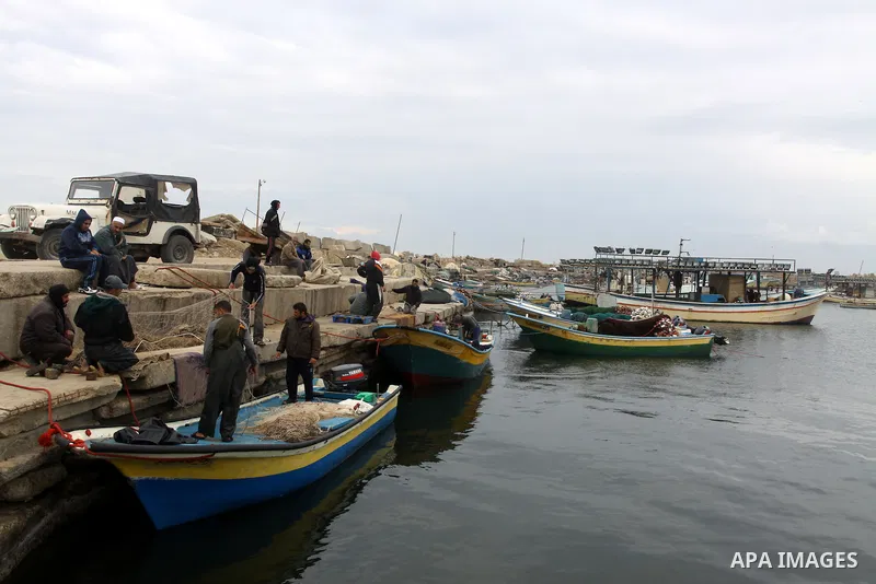 Palestinian fishermen prepare their boats in the port of Gaza on the Mediterranean coast, on November 27, 2012. Israel eased restrictions on Gaza fishermen on Saturday, further implementing truce brokered by Egypt after...