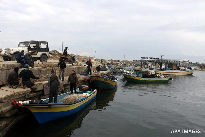 Palestinian fishermen prepare their boats in the port of Gaza on the Mediterranean coast, on November 27, 2012. Israel eased restrictions on Gaza fishermen on Saturday, further implementing truce brokered by Egypt after...