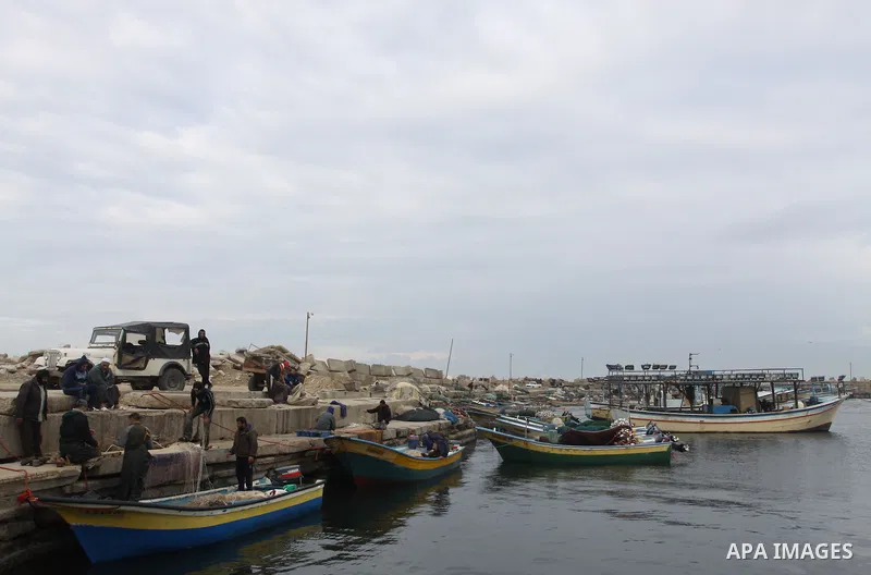 Palestinian fishermen prepare their boats in the port of Gaza on the Mediterranean coast, on November 27, 2012. Israel eased restrictions on Gaza fishermen on Saturday, further implementing truce brokered by Egypt after...