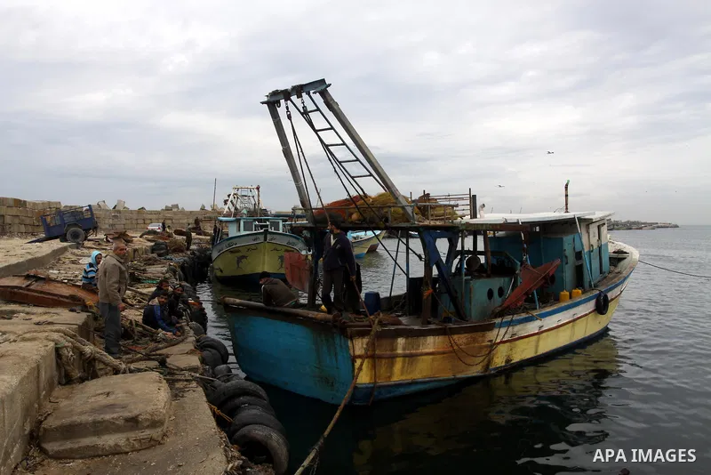 Palestinian fishermen prepare their boats in the port of Gaza on the Mediterranean coast, on November 27, 2012. Israel eased restrictions on Gaza fishermen on Saturday, further implementing truce brokered by Egypt after...