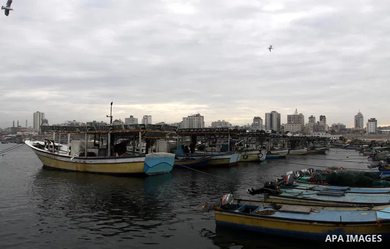 Palestinian fishermen prepare their boats in the port of Gaza on the Mediterranean coast, on November 27, 2012. Israel eased restrictions on Gaza fishermen on Saturday, further implementing truce brokered by Egypt after...