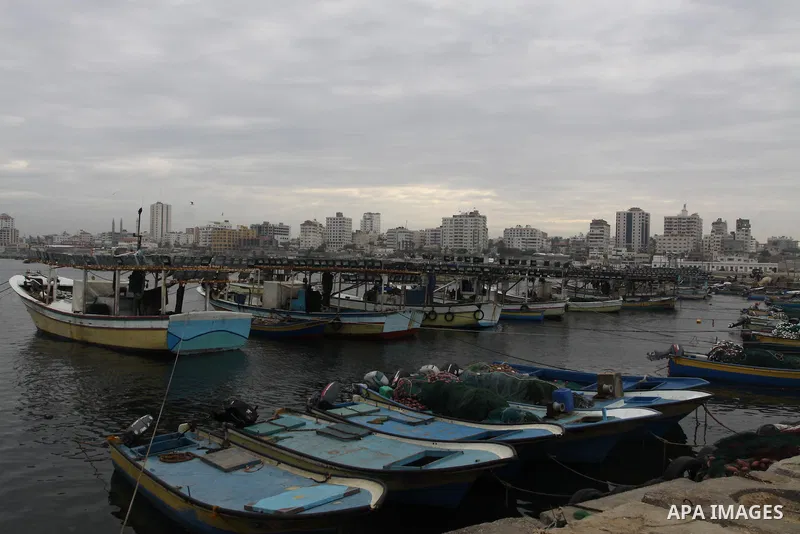Palestinian fishermen prepare their boats in the port of Gaza on the Mediterranean coast, on November 27, 2012. Israel eased restrictions on Gaza fishermen on Saturday, further implementing truce brokered by Egypt after...