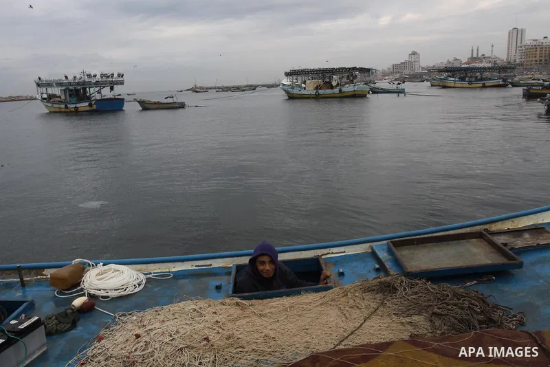 Palestinian fishermen prepare their boats in the port of Gaza on the Mediterranean coast, on November 27, 2012. Israel eased restrictions on Gaza fishermen on Saturday, further implementing truce brokered by Egypt after...