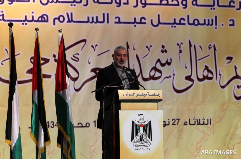 Palestinian Prime Minister in Gaza strip Ismail Haniyeh speaks during a ceremony to honor the families of martyrs in Gaza city on November 27, 2012. Israeli aircraft killed 166 including scores of civilians , and injured...
