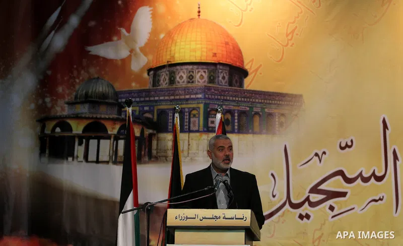 Palestinian Prime Minister in Gaza strip Ismail Haniyeh speaks during a ceremony to honor the families of martyrs in Gaza city on November 27, 2012. Israeli aircraft killed 166 including scores of civilians , and injured...