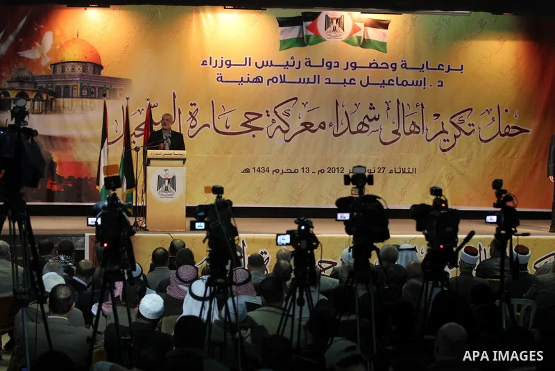 Palestinian Prime Minister in Gaza strip Ismail Haniyeh speaks during a ceremony to honor the families of martyrs in Gaza city on November 27, 2012. Israeli aircraft killed 166 including scores of civilians , and injured...