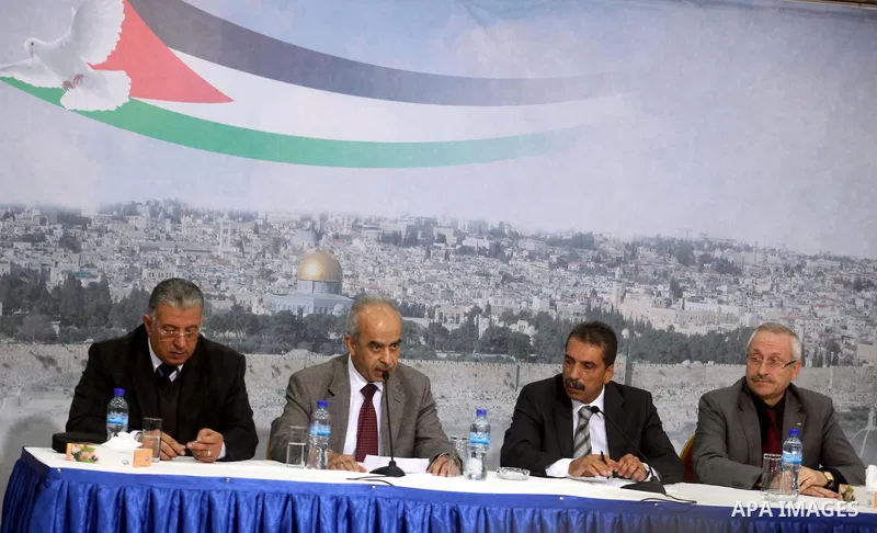 From right to left: Palestinian health minister Hani Abdin, , Abdullah al-Bashir, head of the Arafat Foundation's medical committee, Tawfiq Tirawi, the head of the Palestinian inquiry team into the death of the late Pale...