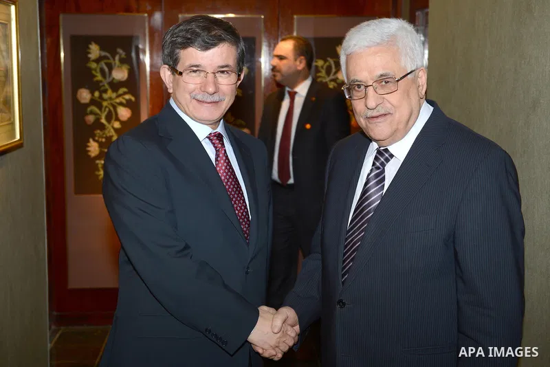 Palestinian President Mahmoud Abbas (Abu Mazen) meets with Turkish Foreign Minister Ahmed Daoud oghlu in New York, on Nov. 28, 2012. Photo by Thaer Ganaim