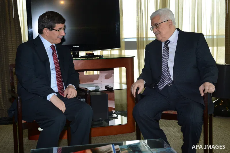 Palestinian President Mahmoud Abbas (Abu Mazen) meets with Turkish Foreign Minister Ahmed Daoud oghlu in New York, on Nov. 28, 2012. Photo by Thaer Ganaim