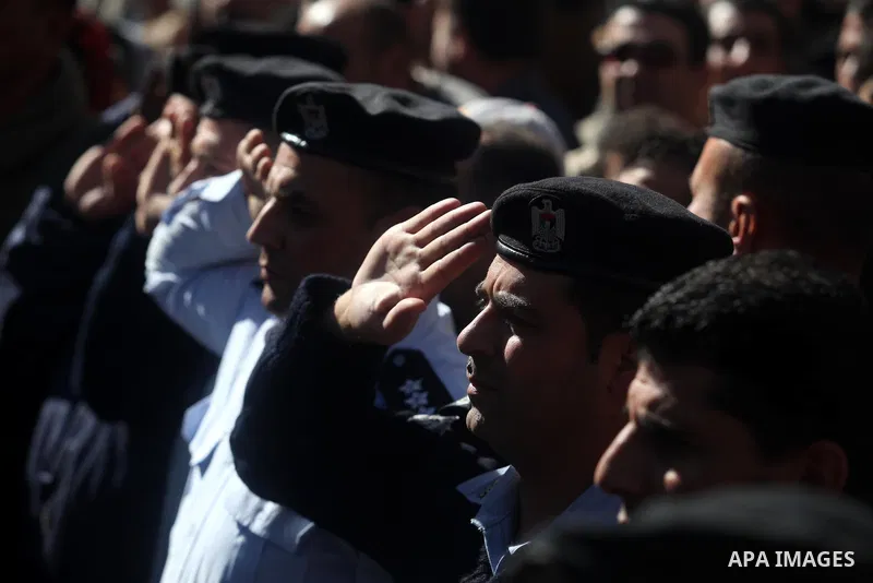 Palestinian policemen stand ready during a rally in the West Bank city of Ramallah on November 29, 2012 to support Palestinian leader Mahmud Abbas who is heading to the United Nations General Assembly today with huge bac...