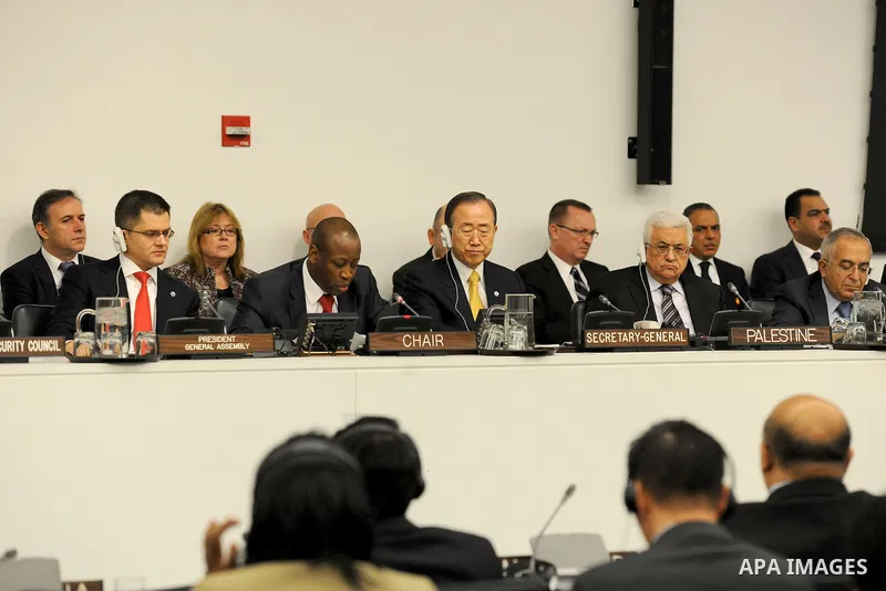 Palestinian President Mahmoud Abbas and United Nations Secretary General Ban Ki-moon, listen during the Special Meeting of the Committee on the Exercise of the Inalienable Rights of the Palestinian People, in observance...