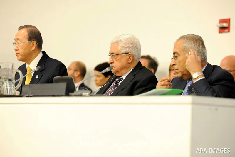 Palestinian President Mahmoud Abbas and United Nations Secretary General Ban Ki-moon, listen during the Special Meeting of the Committee on the Exercise of the Inalienable Rights of the Palestinian People, in observance...