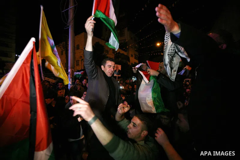 Palestinians celebrate in the West Bank city of Hebron on November 29, 2012 after the General Assembly voted to recognise Palestine as a non-member state. The UN General Assembly on Thursday voted overwhelmingly to recog...