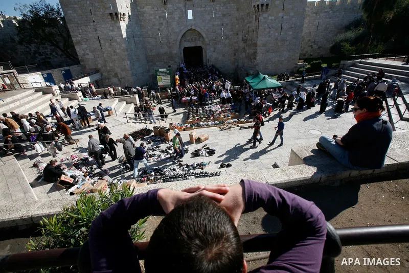 Palestinians walk at the al-Aqsa mosque compound following the Friday prayer in Jerusalem's old city on November 30, 2012. Photo by Mahfouz Abu Turk