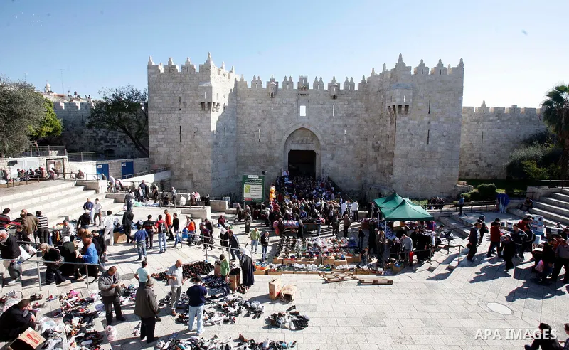 Palestinians walk at the al-Aqsa mosque compound following the Friday prayer in Jerusalem's old city on November 30, 2012. Photo by Mahfouz Abu Turk