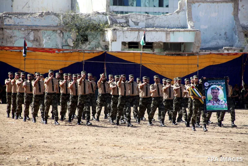 Interior Ministry officers march in formation during a graduation ceremony from a military course in Gaza city on Dec. 02, 2012. Photo by Ashraf Amra