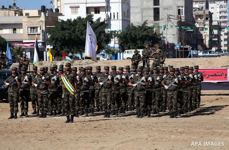 Interior Ministry officers march in formation during a graduation ceremony from a military course in Gaza city on Dec. 02, 2012. Photo by Ashraf Amra
