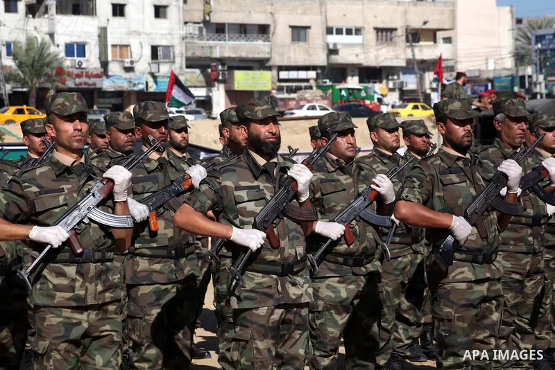 Interior Ministry officers march in formation during a graduation ceremony from a military course in Gaza city on Dec. 02, 2012. Photo by Ashraf Amra