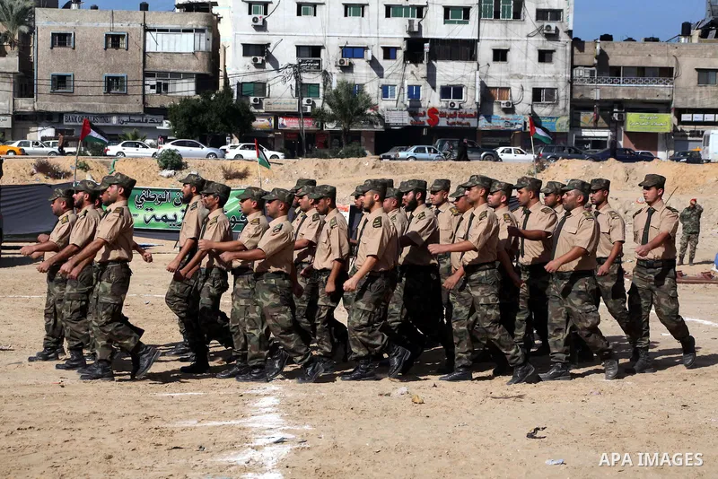 Interior Ministry officers march in formation during a graduation ceremony from a military course in Gaza city on Dec. 02, 2012. Photo by Ashraf Amra