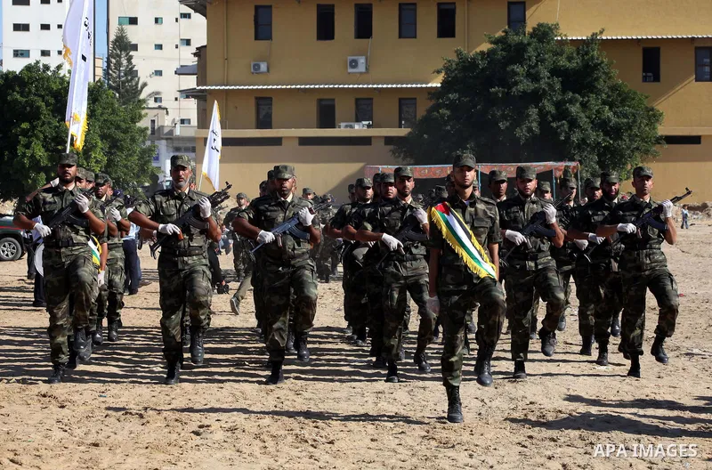 Interior Ministry officers march in formation during a graduation ceremony from a military course in Gaza city on Dec. 02, 2012. Photo by Ashraf Amra