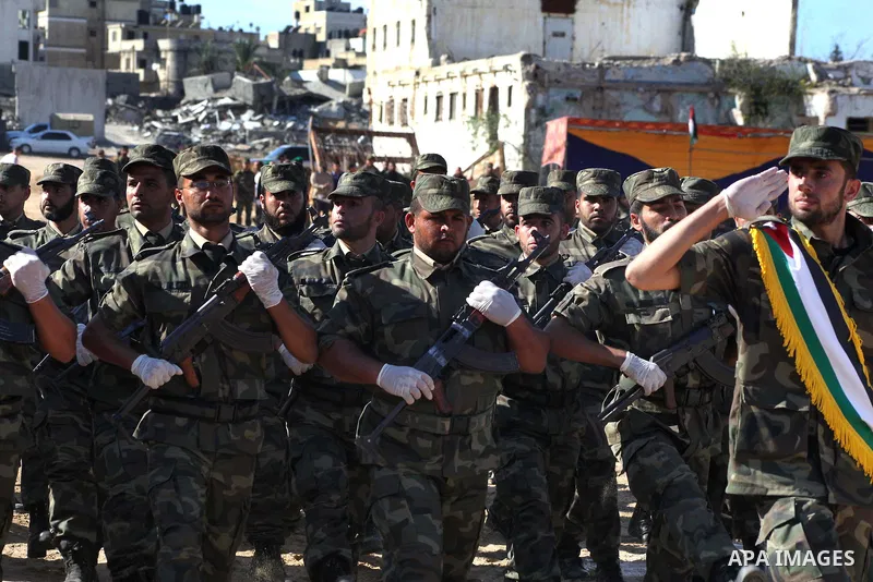 Interior Ministry officers march in formation during a graduation ceremony from a military course in Gaza city on Dec. 02, 2012. Photo by Ashraf Amra