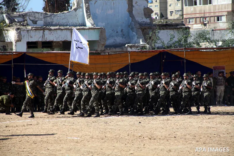 Interior Ministry officers march in formation during a graduation ceremony from a military course in Gaza city on Dec. 02, 2012. Photo by Ashraf Amra