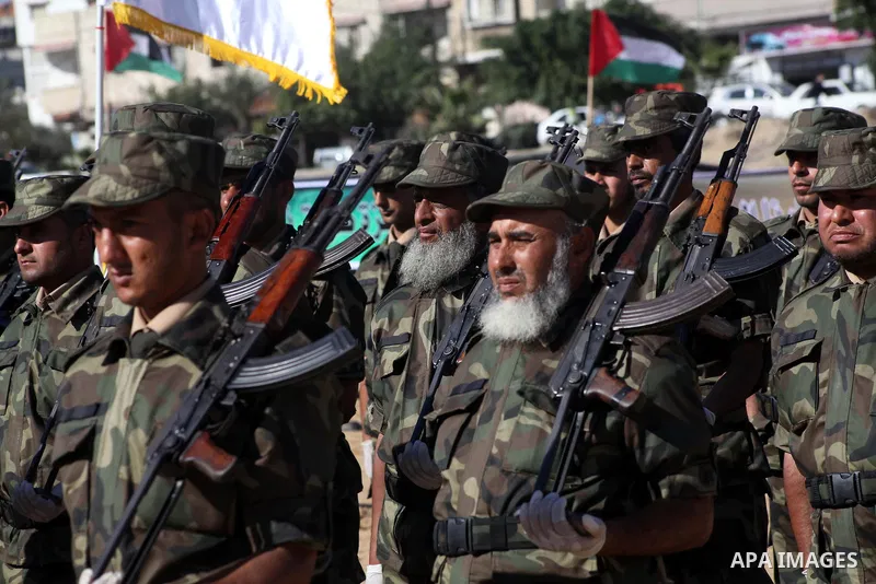Interior Ministry officers march in formation during a graduation ceremony from a military course in Gaza city on Dec. 02, 2012. Photo by Ashraf Amra