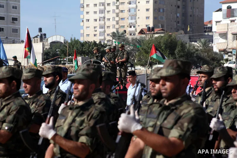 Interior Ministry officers march in formation during a graduation ceremony from a military course in Gaza city on Dec. 02, 2012. Photo by Ashraf Amra
