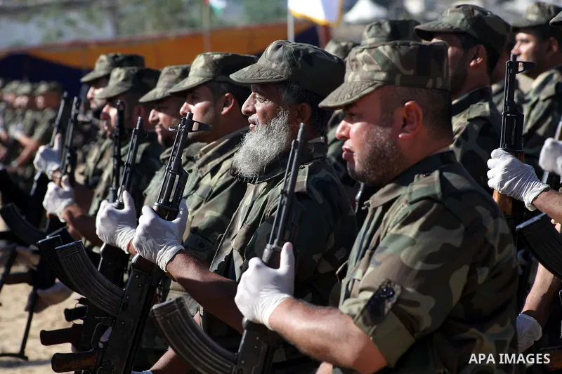 Interior Ministry officers march in formation during a graduation ceremony from a military course in Gaza city on Dec. 02, 2012. Photo by Ashraf Amra