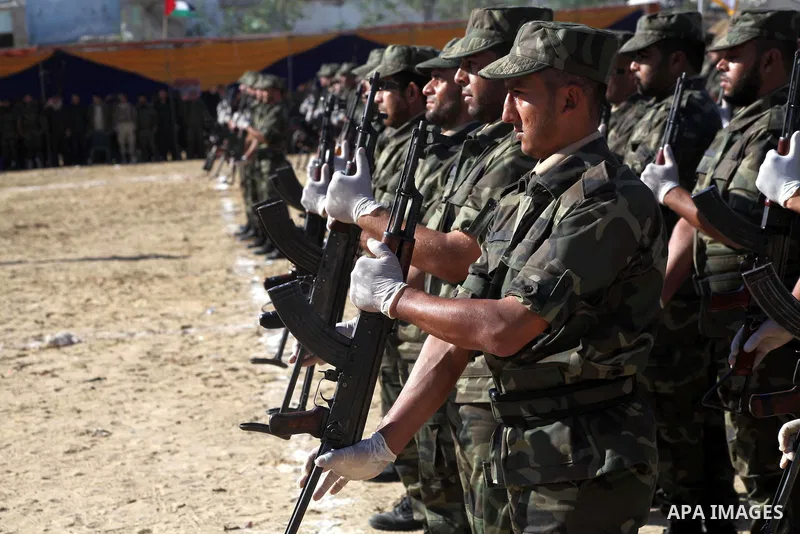 Interior Ministry officers march in formation during a graduation ceremony from a military course in Gaza city on Dec. 02, 2012. Photo by Ashraf Amra
