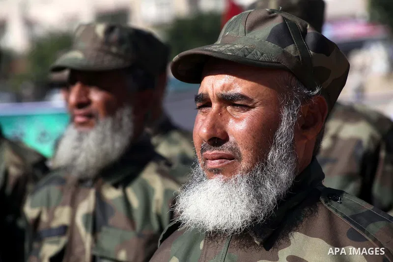 Interior Ministry officers march in formation during a graduation ceremony from a military course in Gaza city on Dec. 02, 2012. Photo by Ashraf Amra