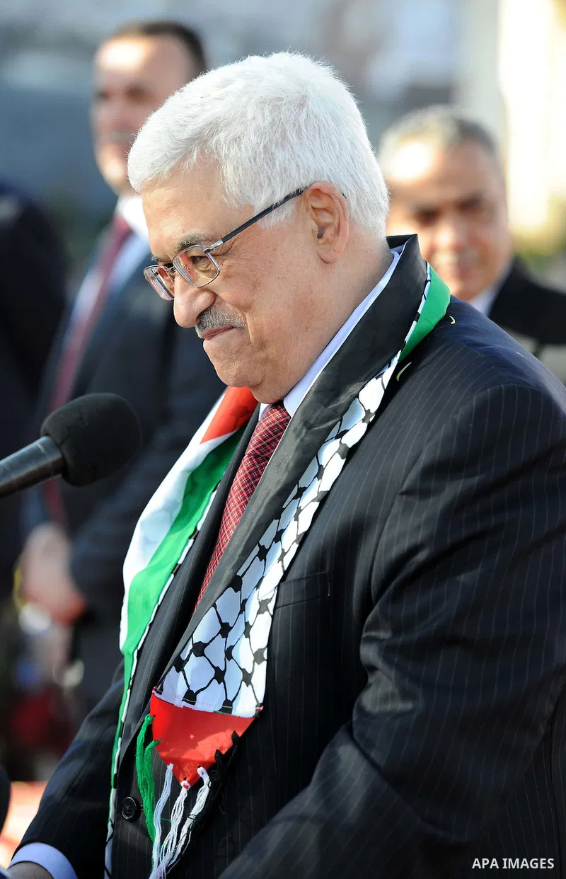 Palestinian President Mahmoud Abbas speaks as Palestinians celebrate their successful bid for UN non-member observer state status, in the West Bank city of Ramallah on December 2, 2012, Abbas arrived to the West Bank aft...