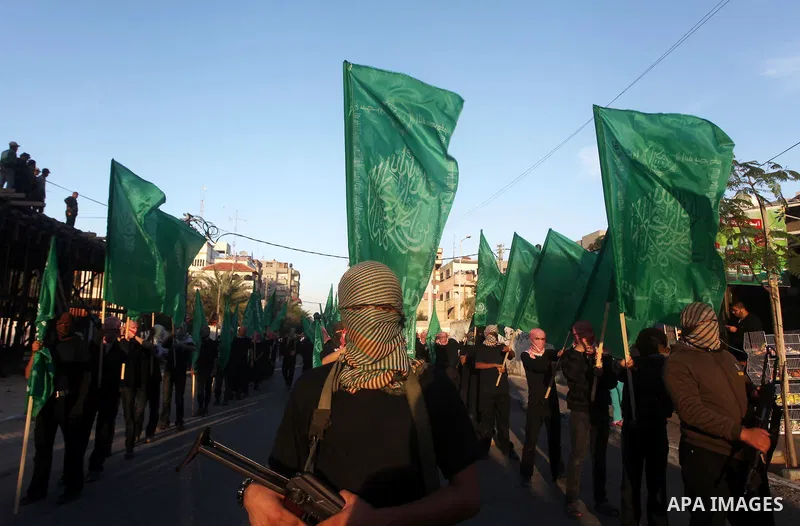 Palestinian members of al-Qassam brigades, the armed wing of the Hamas movement, take part in an anti-Israel parade in Gaza City December 2, 2012. Eight days of Israeli air strikes on Gaza and cross-border Palestinian ro...