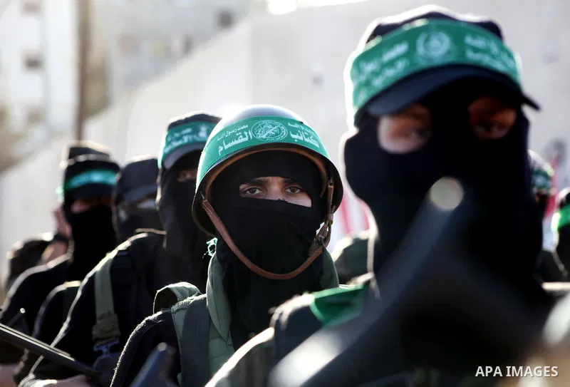 Palestinian members of al-Qassam brigades, the armed wing of the Hamas movement, take part in an anti-Israel parade in Gaza City December 2, 2012. Eight days of Israeli air strikes on Gaza and cross-border Palestinian ro...