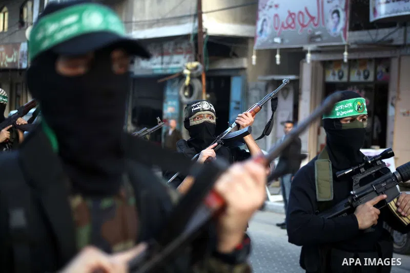 Palestinian members of al-Qassam brigades, the armed wing of the Hamas movement, take part in an anti-Israel parade in Gaza City December 2, 2012. Eight days of Israeli air strikes on Gaza and cross-border Palestinian ro...