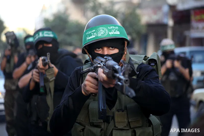 Palestinian members of al-Qassam brigades, the armed wing of the Hamas movement, take part in an anti-Israel parade in Gaza City December 2, 2012. Eight days of Israeli air strikes on Gaza and cross-border Palestinian ro...